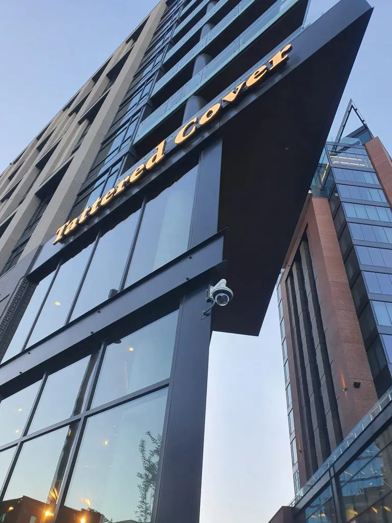 A building with a large sign on the side of it