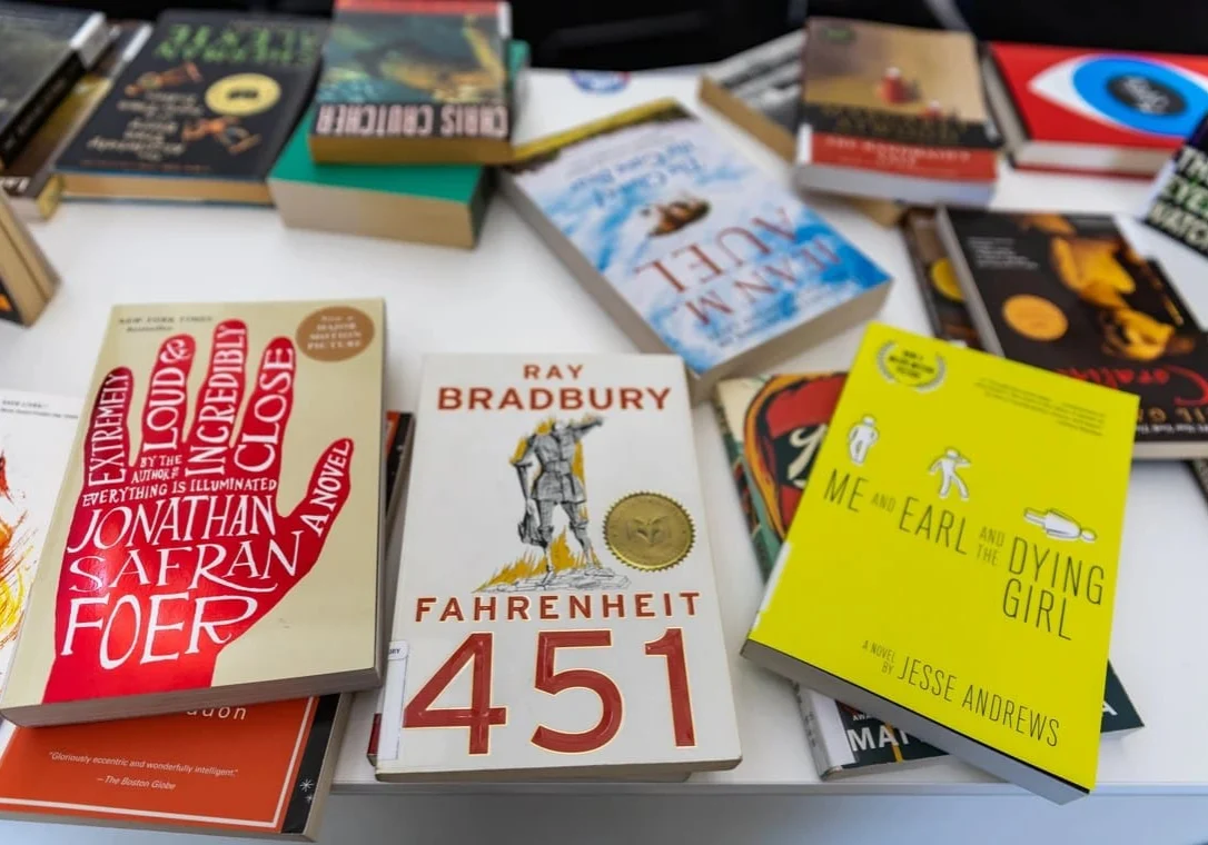 Books spread on a table